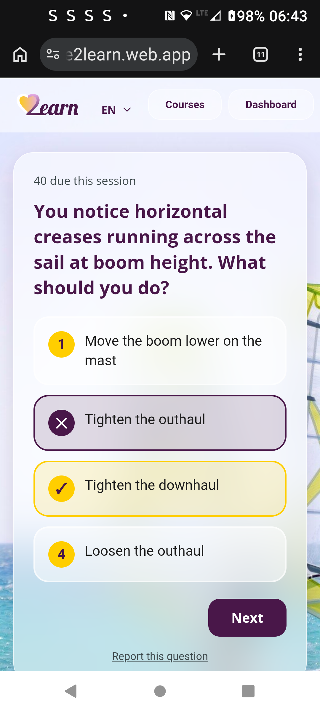 Review screen showing a wrong answer marked with a cross next to the correct answer highlighted in gold